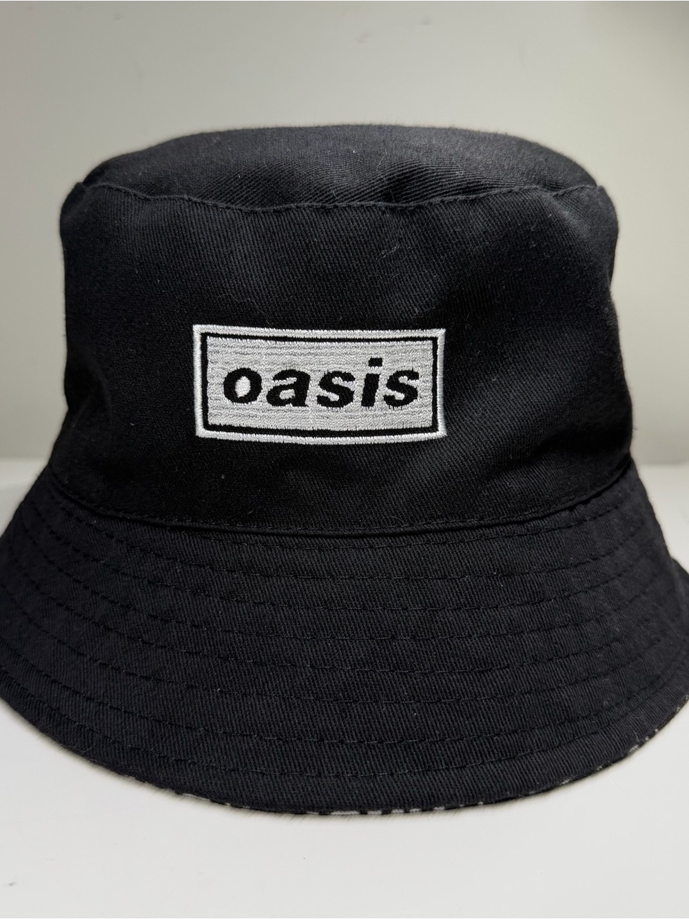 Oasis Live ‘25 reversible bucket hat official merchandise Liam Noel Gallagher